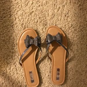 Steel or metallic INC sandals
